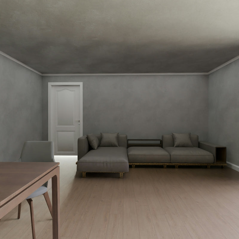 A room with a couch and a table in it