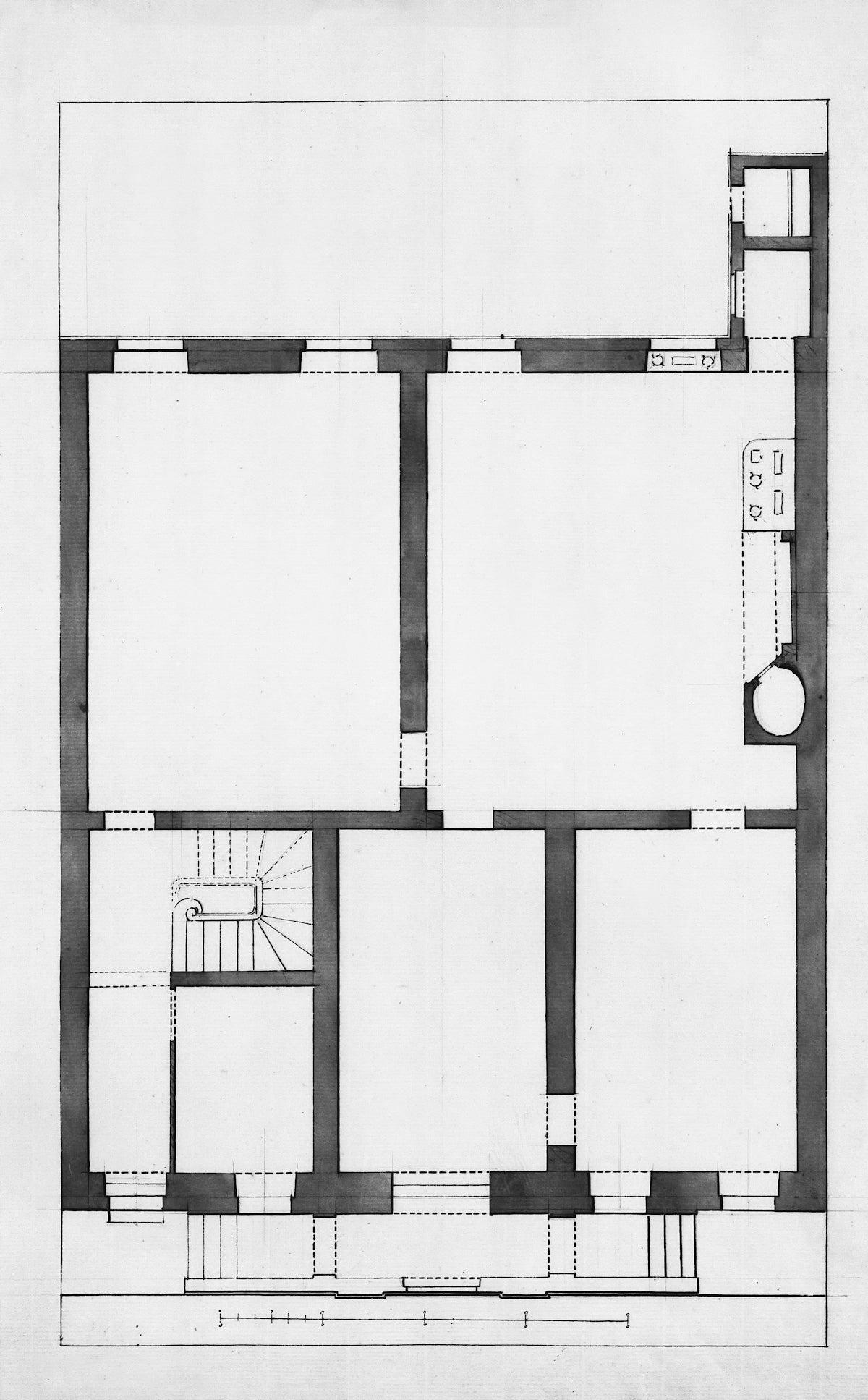 Architectural floor plan of a building with rooms and stairs.